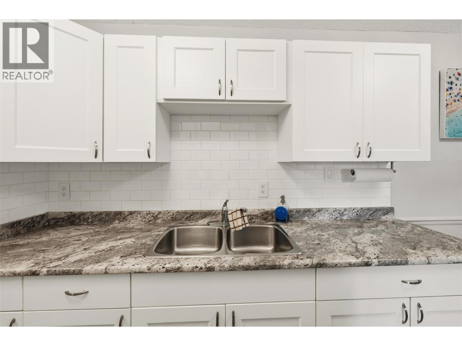 #104 110 Skaha Place - 22