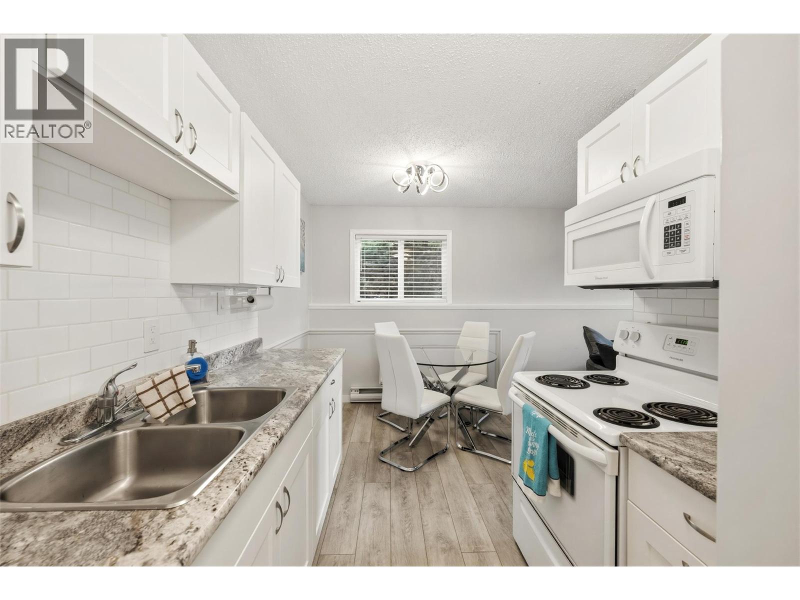 #104 110 Skaha Place - 23