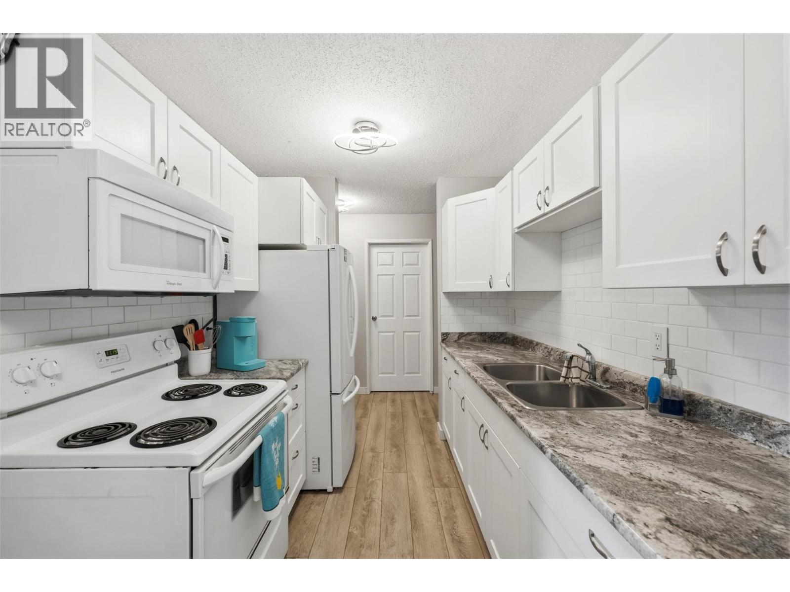 #104 110 Skaha Place - 20