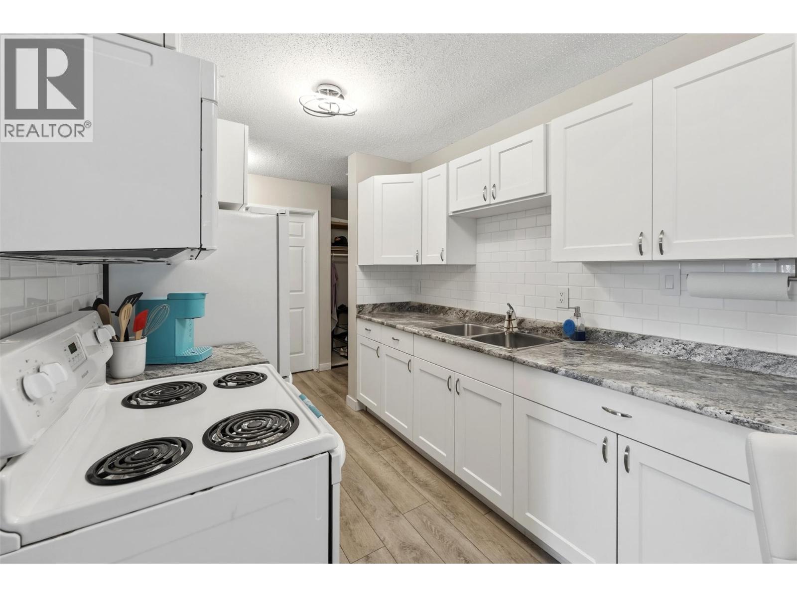 #104 110 Skaha Place - 21