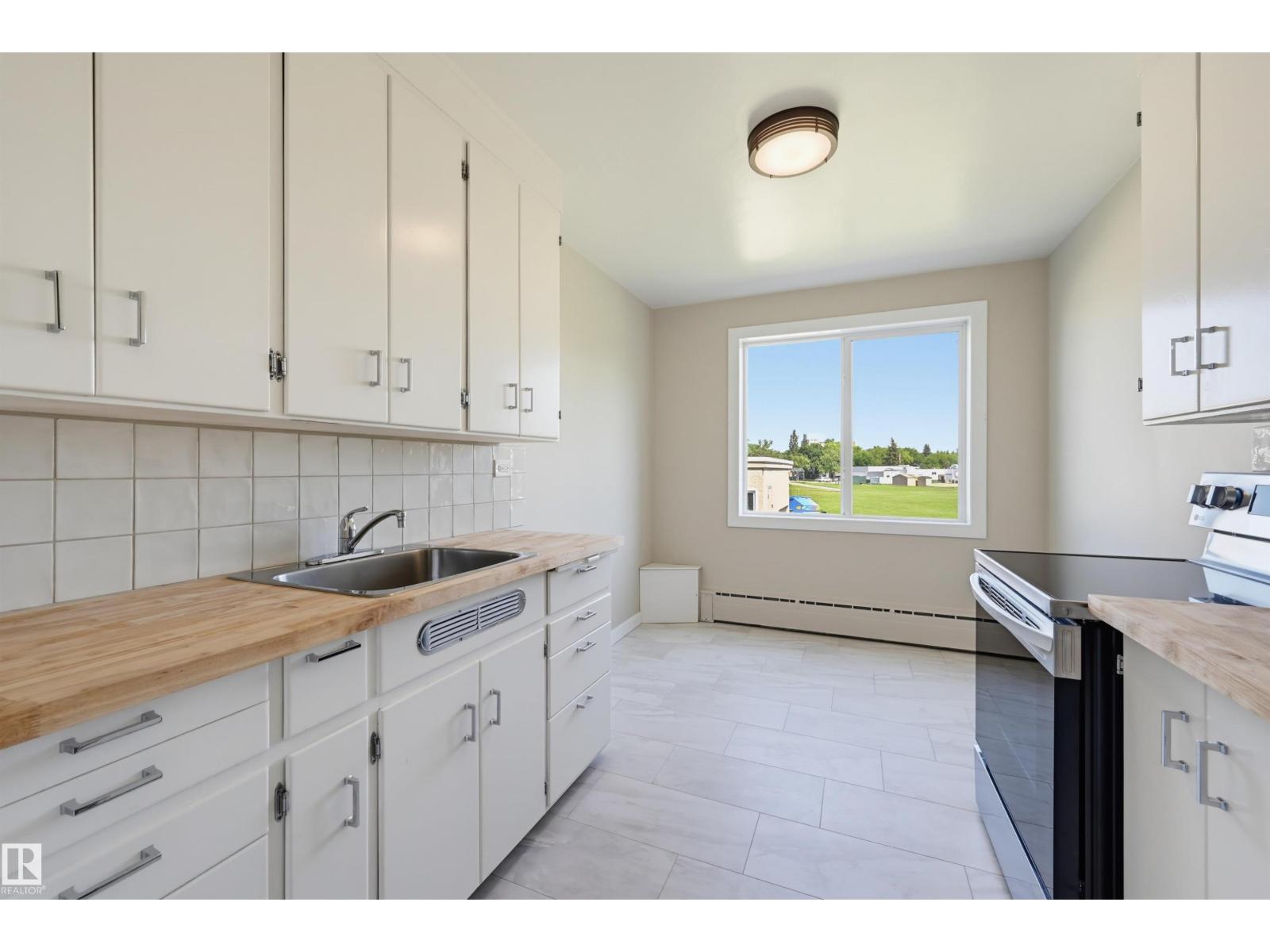 #7 7307 118 ST NW - 6