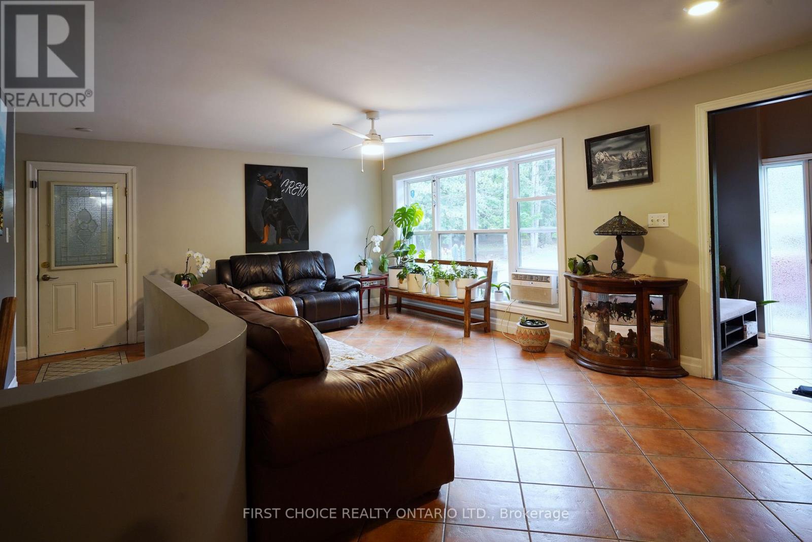 Heated floors. Entry to Breezeway, garage.