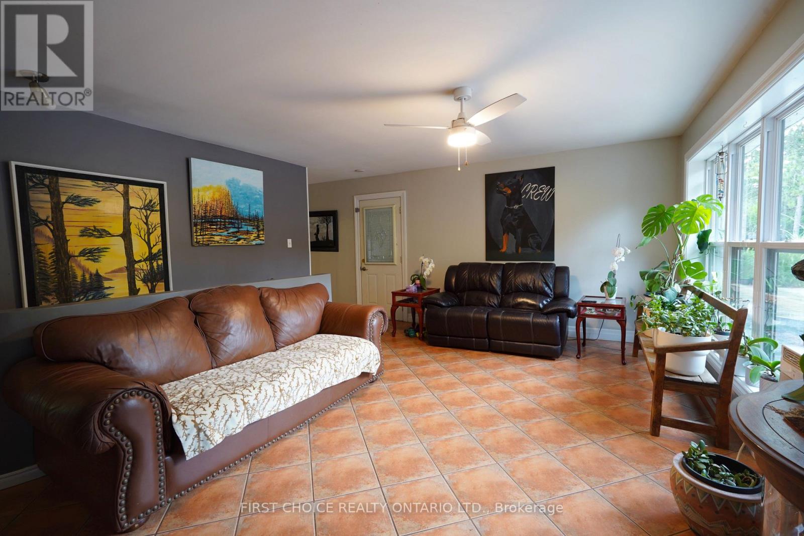 Bright, spacious living room. Picture windows.