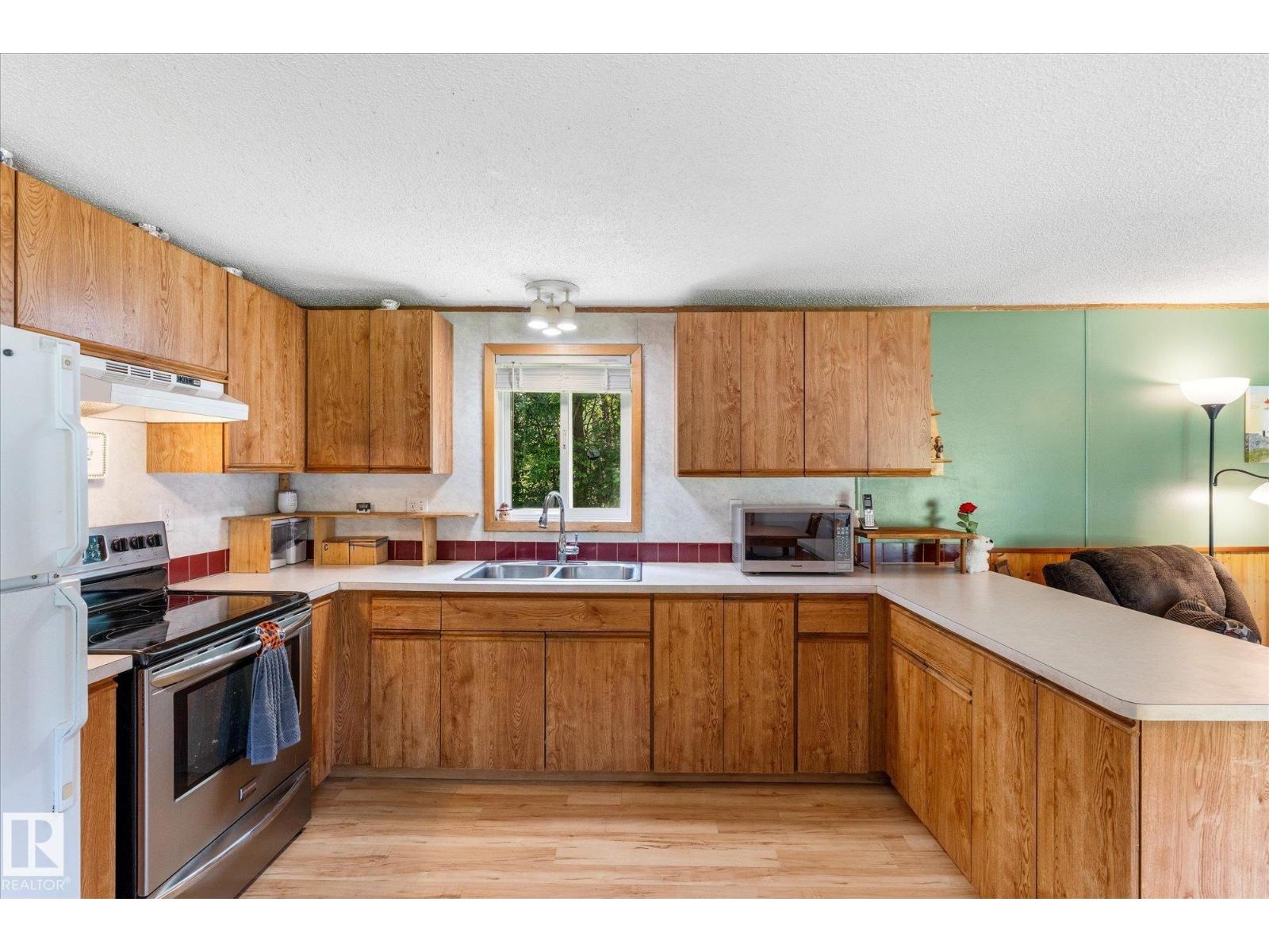 56304 RGE ROAD 13 - 20
