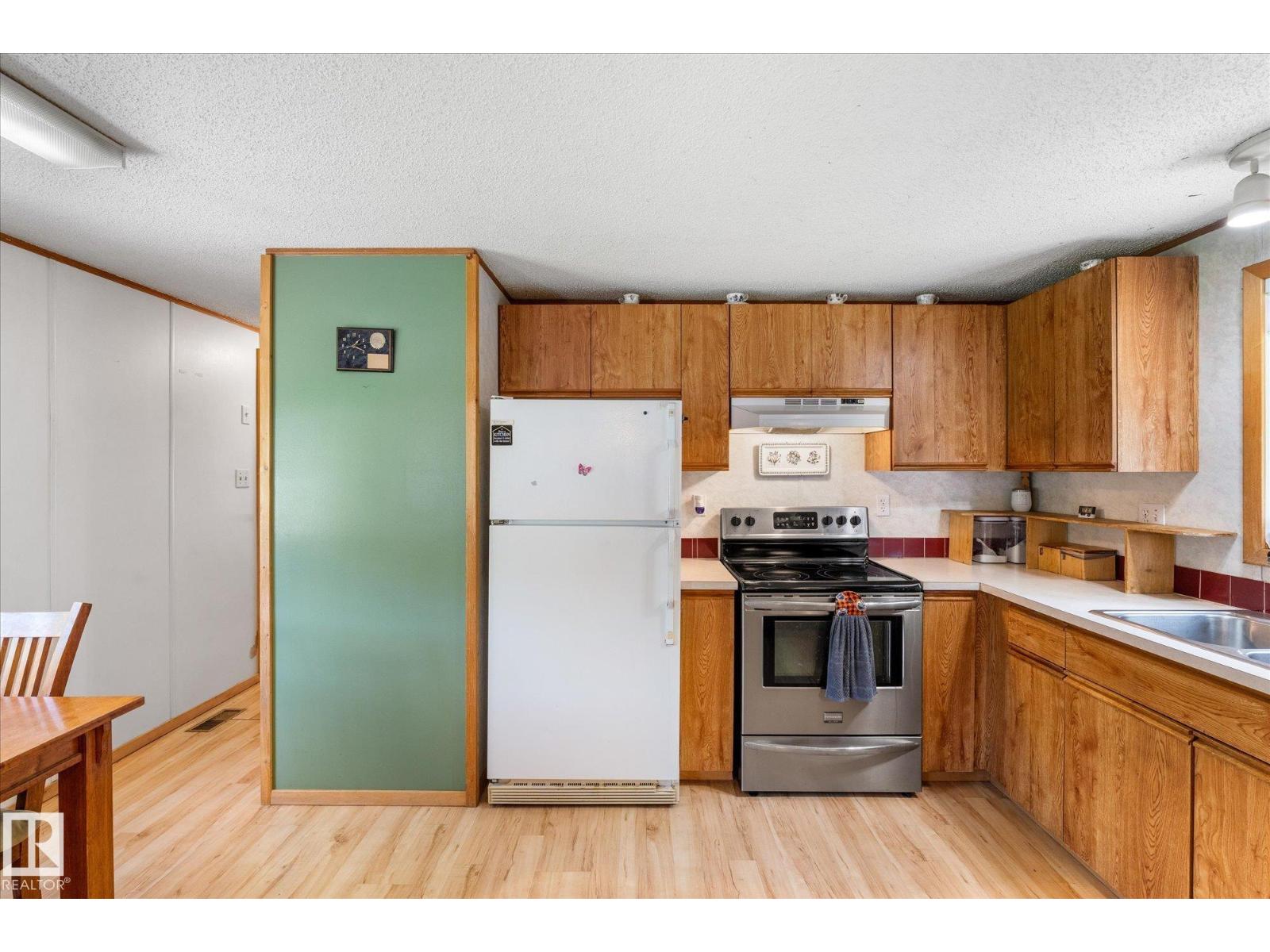 56304 RGE ROAD 13 - 21