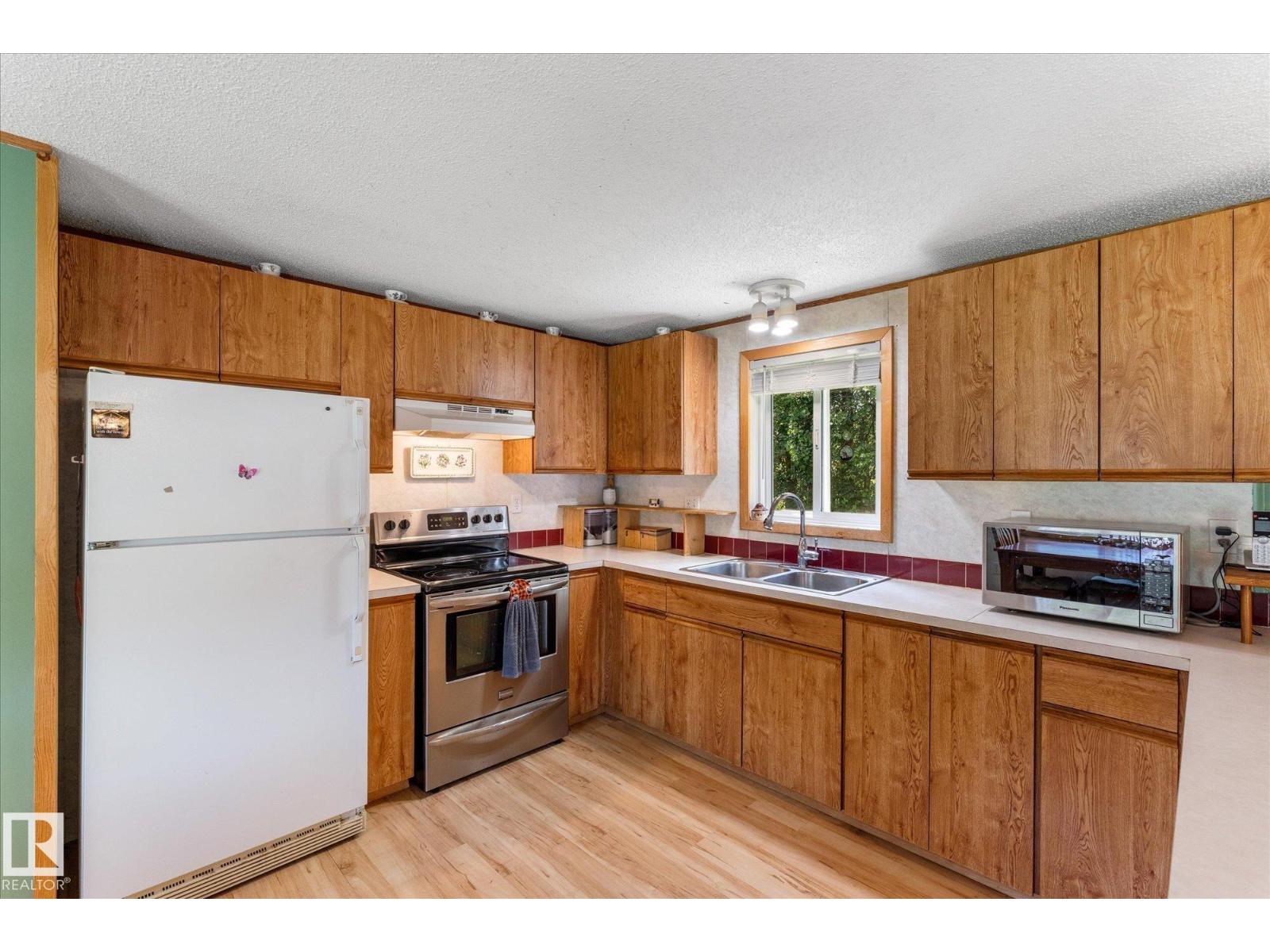 56304 RGE ROAD 13 - 22