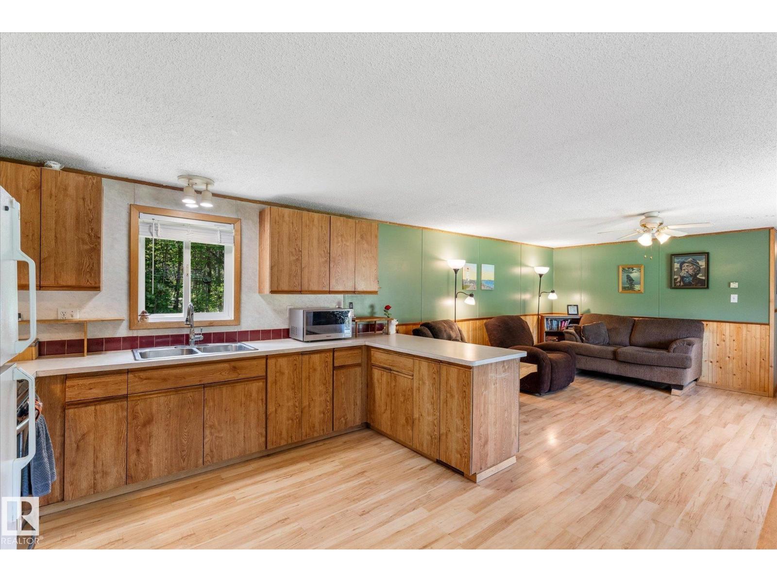 56304 RGE ROAD 13 - 23