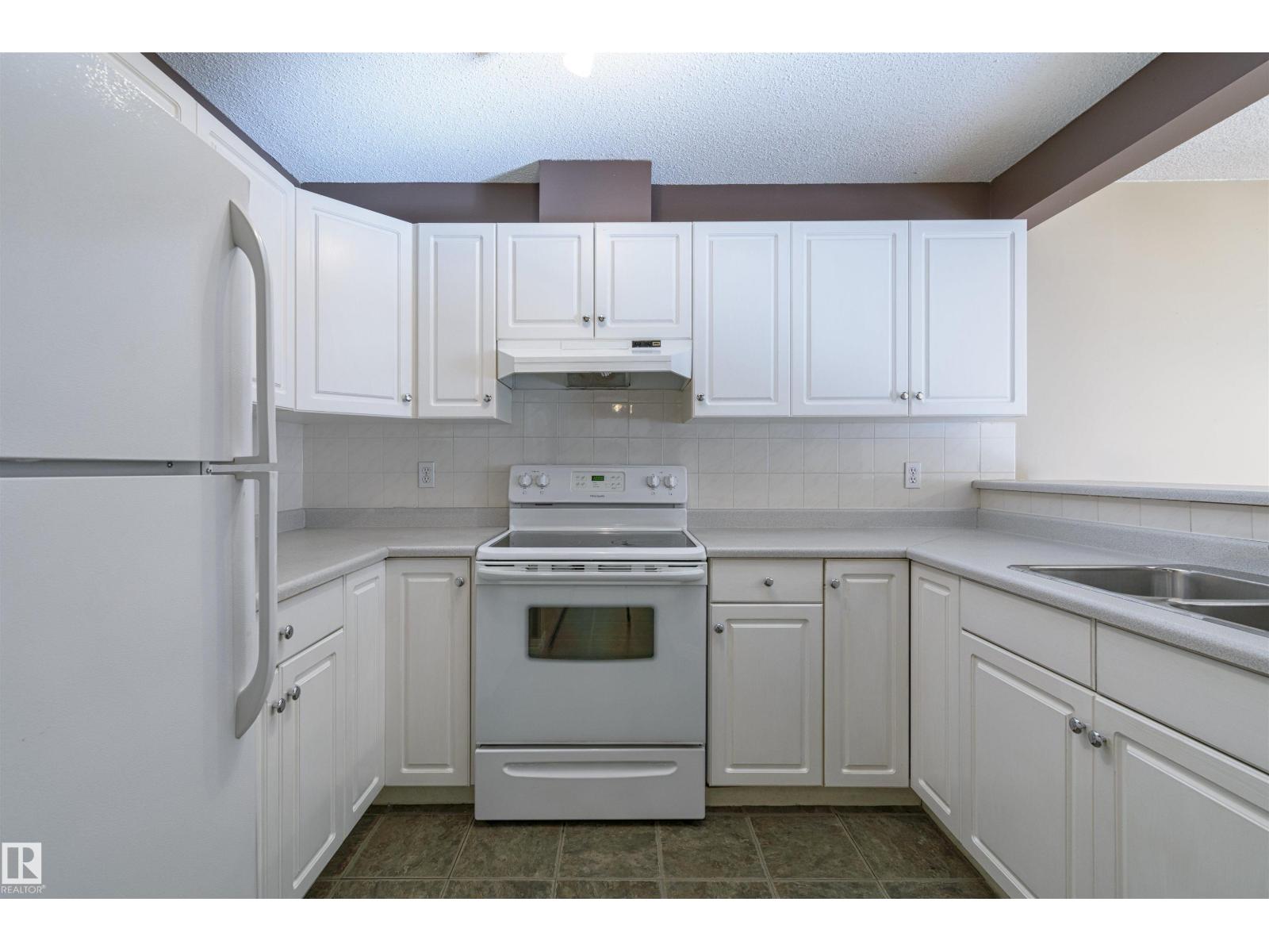 #107 10153 117 ST NW - 4