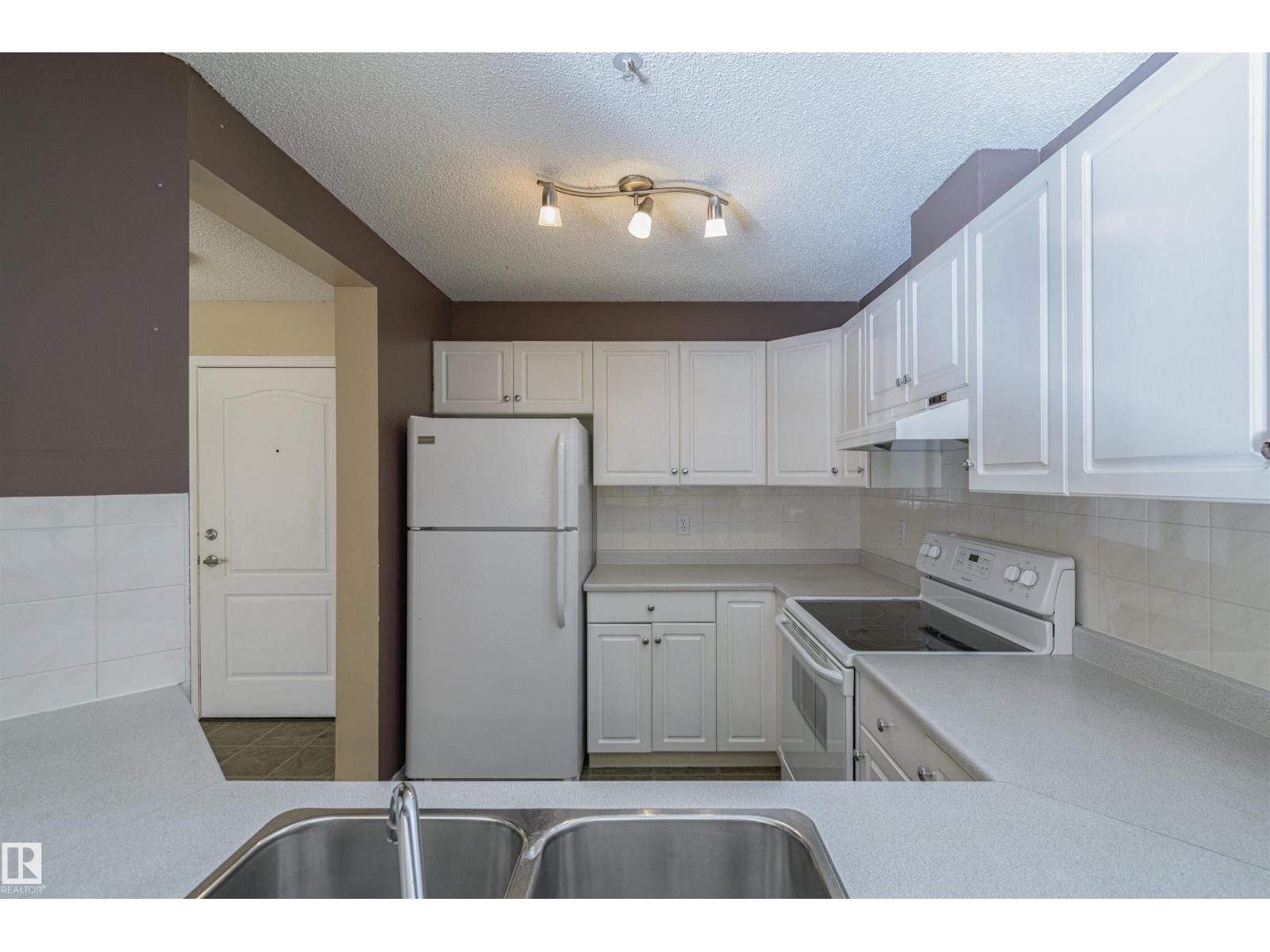 #107 10153 117 ST NW - 6