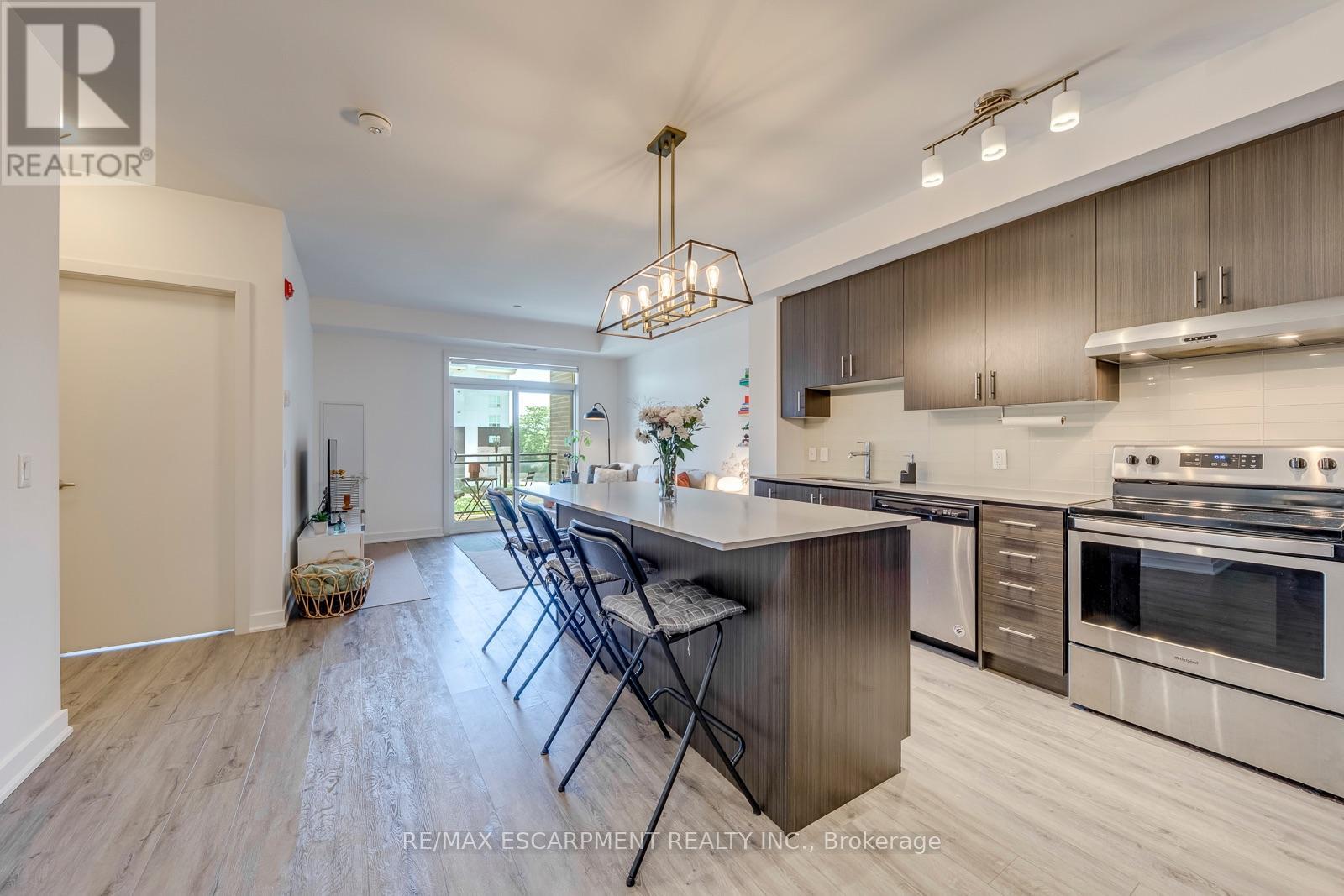 #303 320 PLAINS ROAD E - 13