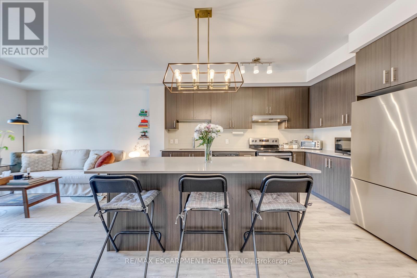 #303 320 PLAINS ROAD E - 14