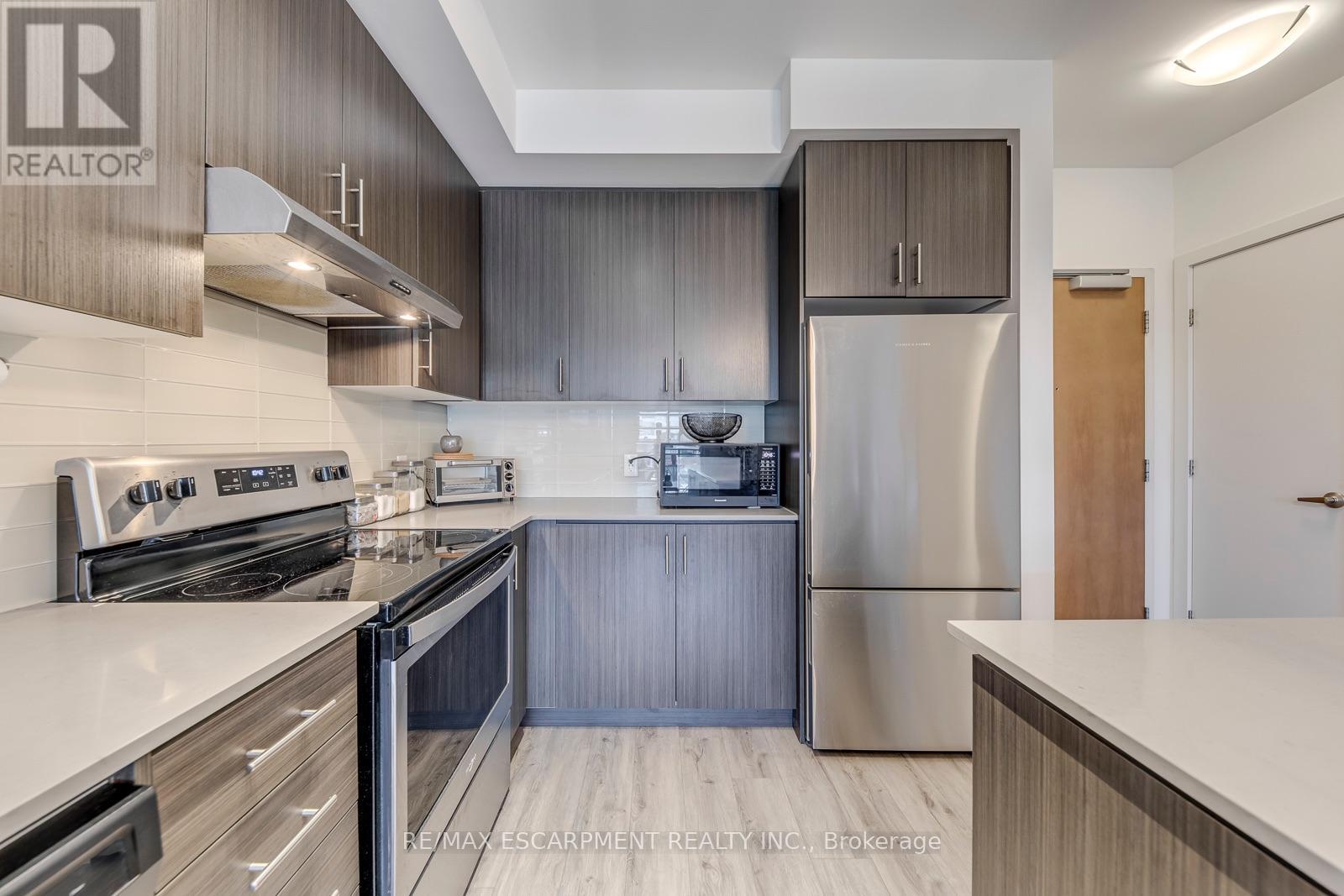 #303 320 PLAINS ROAD E - 16