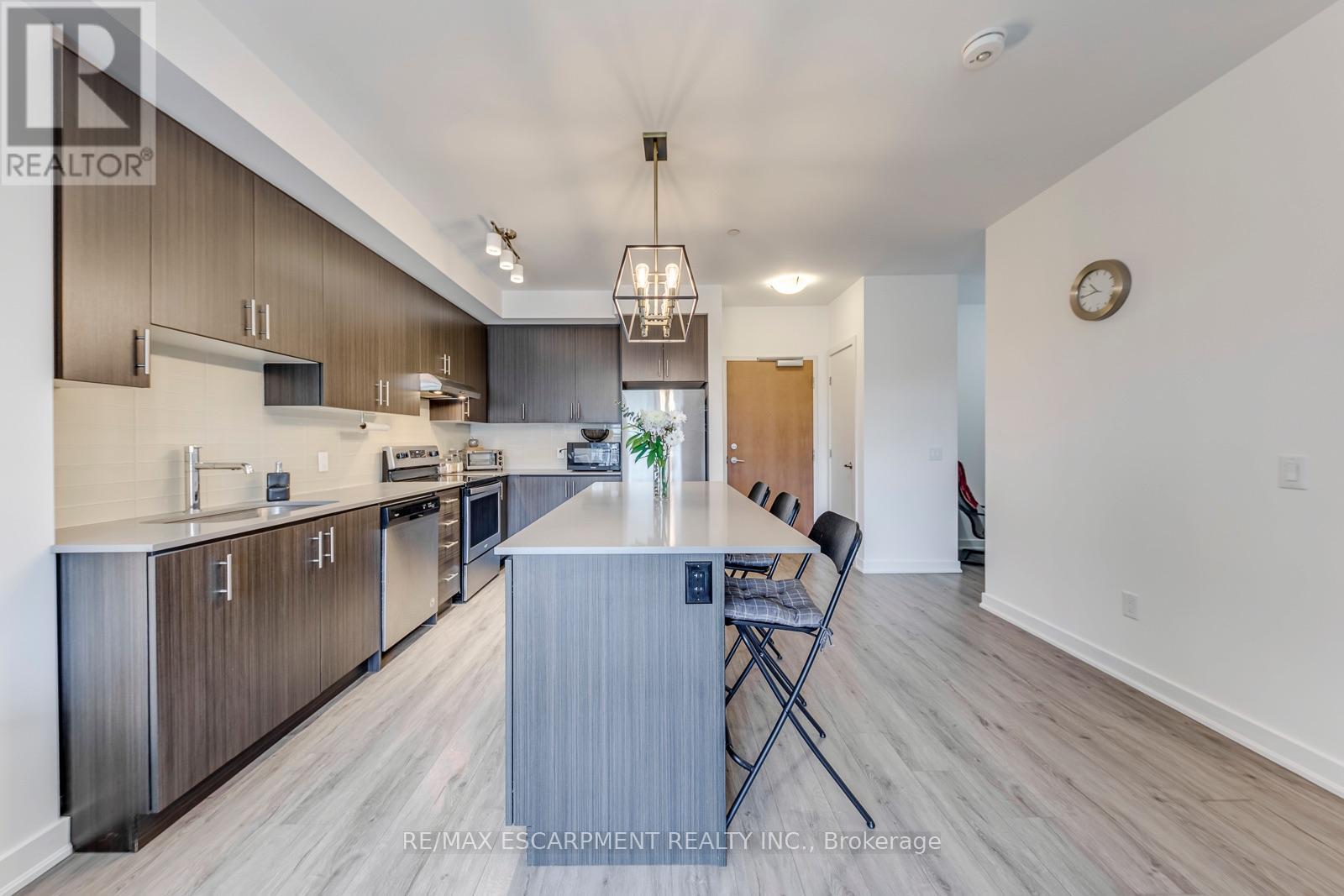 #303 320 PLAINS ROAD E - 17
