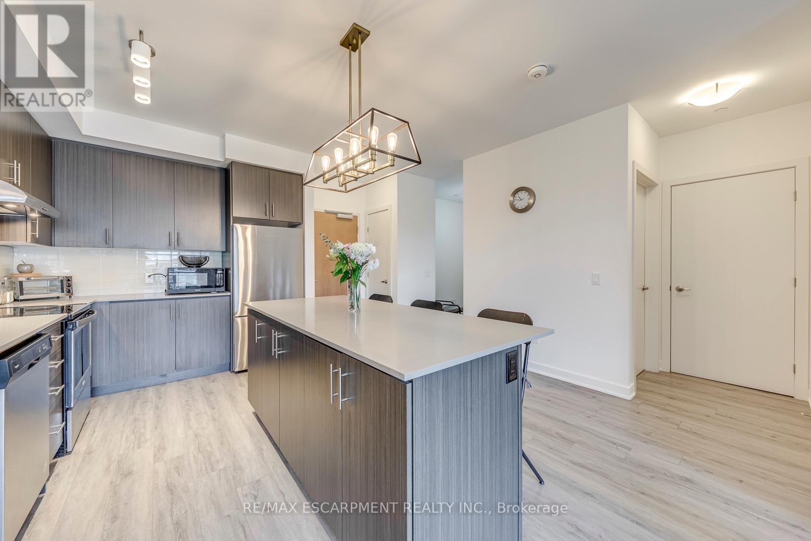 #303 320 PLAINS ROAD E - 21