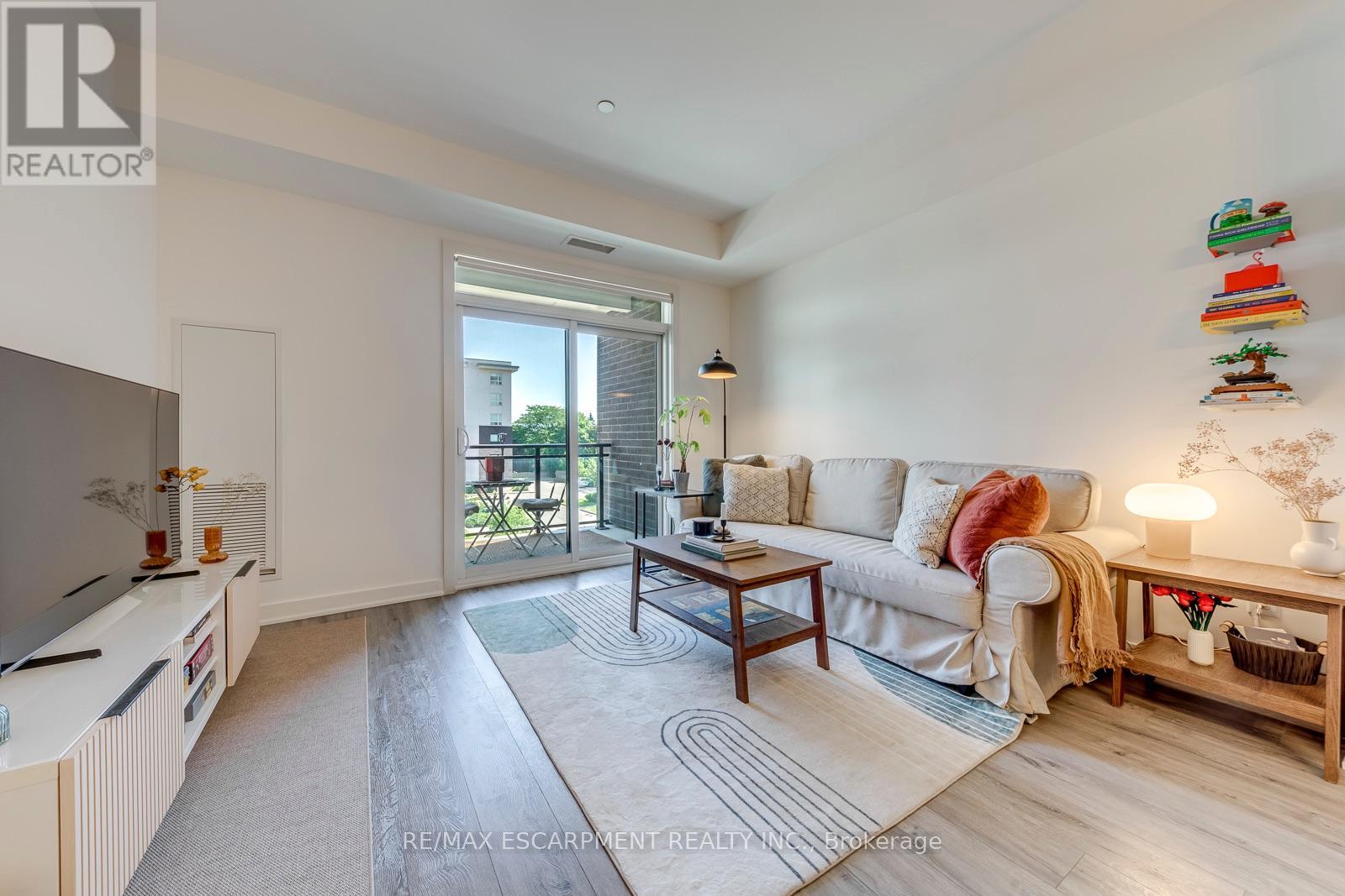 #303 320 PLAINS ROAD E - 22