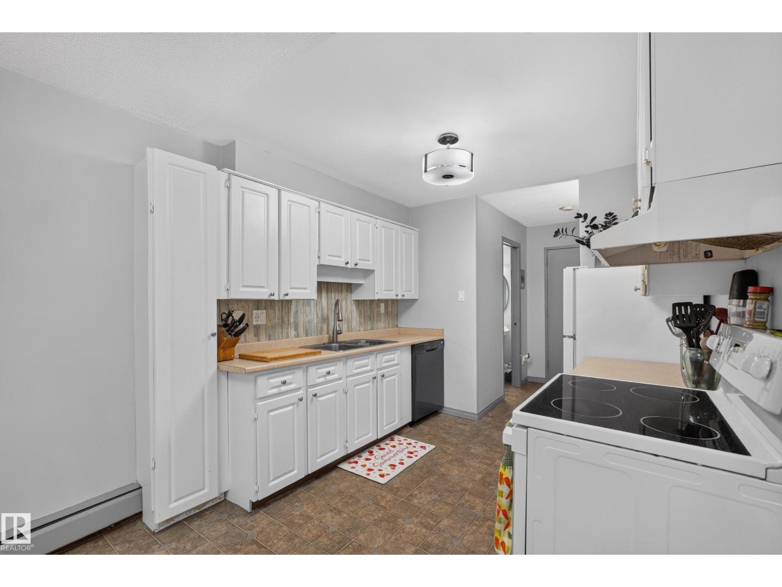 #103 7805 159 ST NW - 10