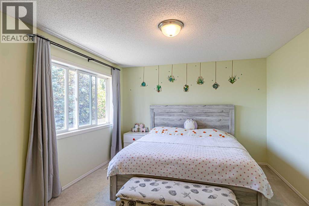 88 Tuscany Ravine Crescent NW — photo 19