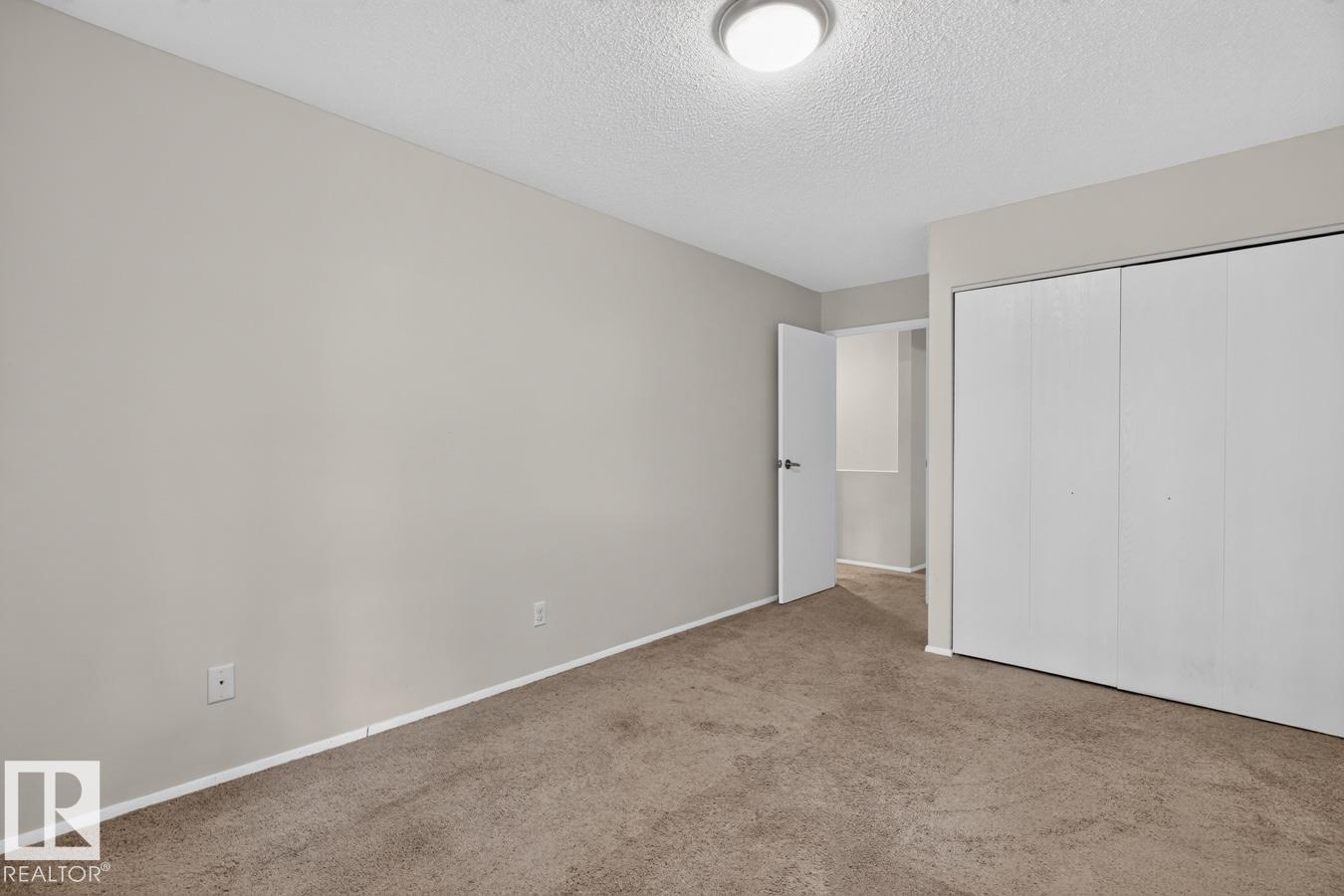 #106 237 WOODVALE RD W NW - 19