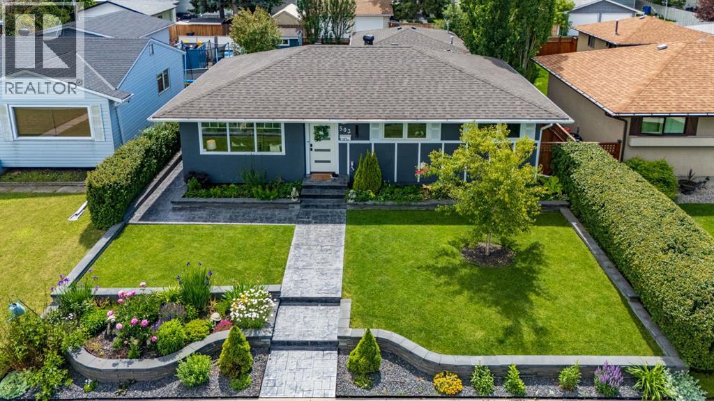Stamped concrete gives this front/side yard a very manicured feel