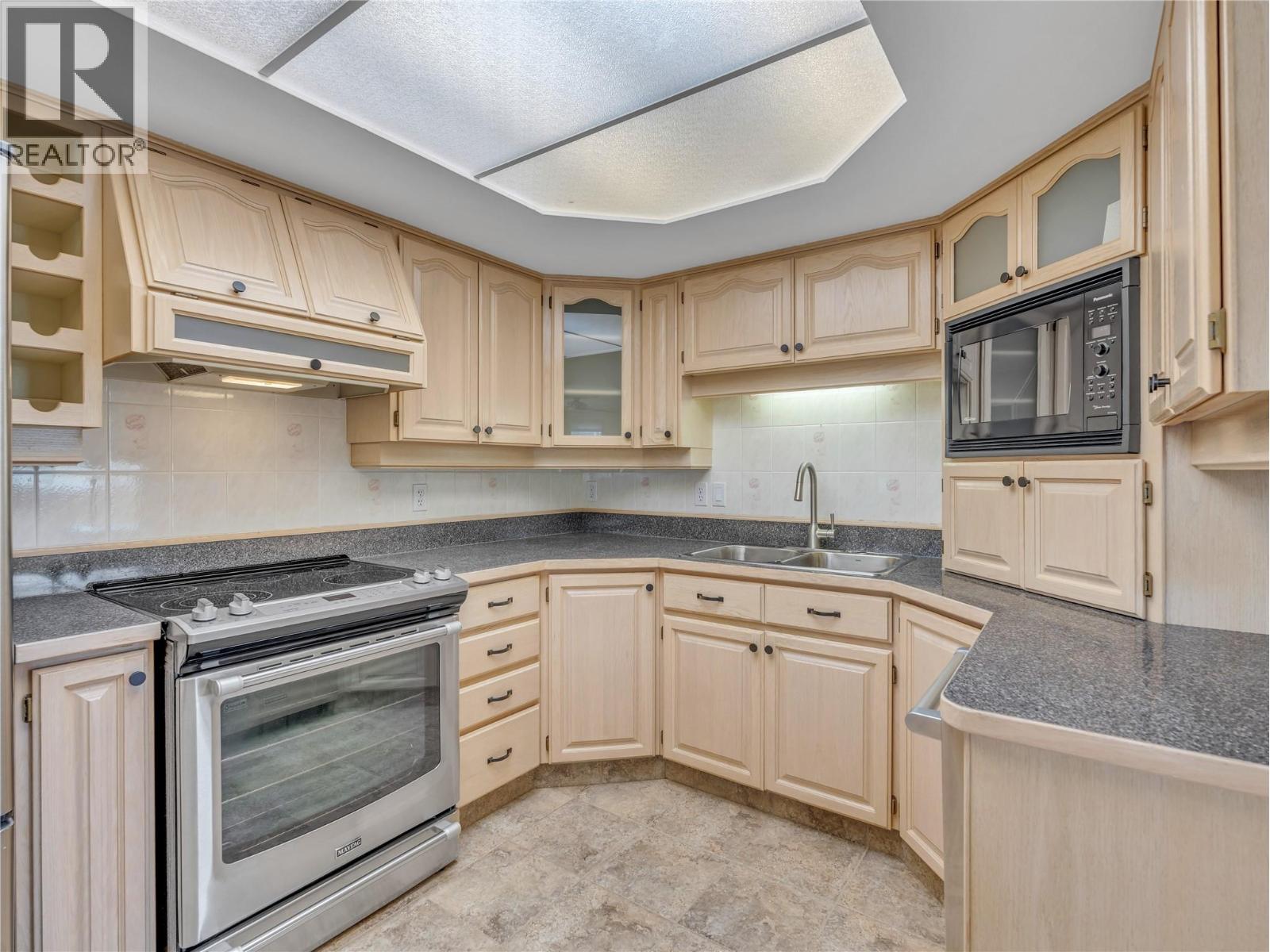#312 3595 SKAHA LAKE Road - 11