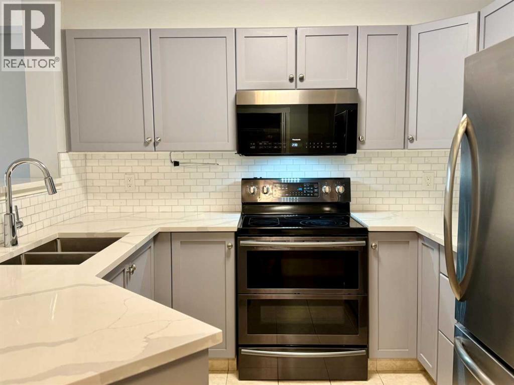 #1212 2518 Fish Creek Boulevard SW - 2