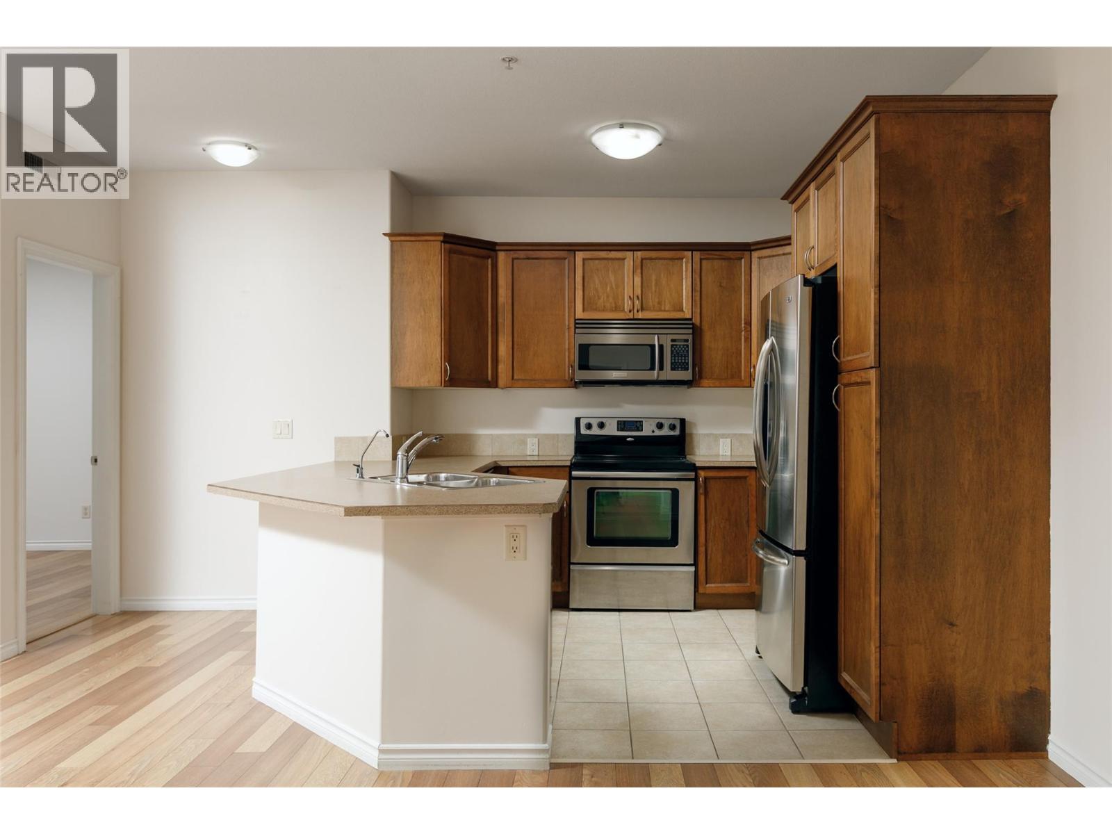 #208 1007 Harvey Avenue - 1