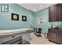 309 - 712 Davis Drive, Newmarket, ON L3Y8C3 Photo 14