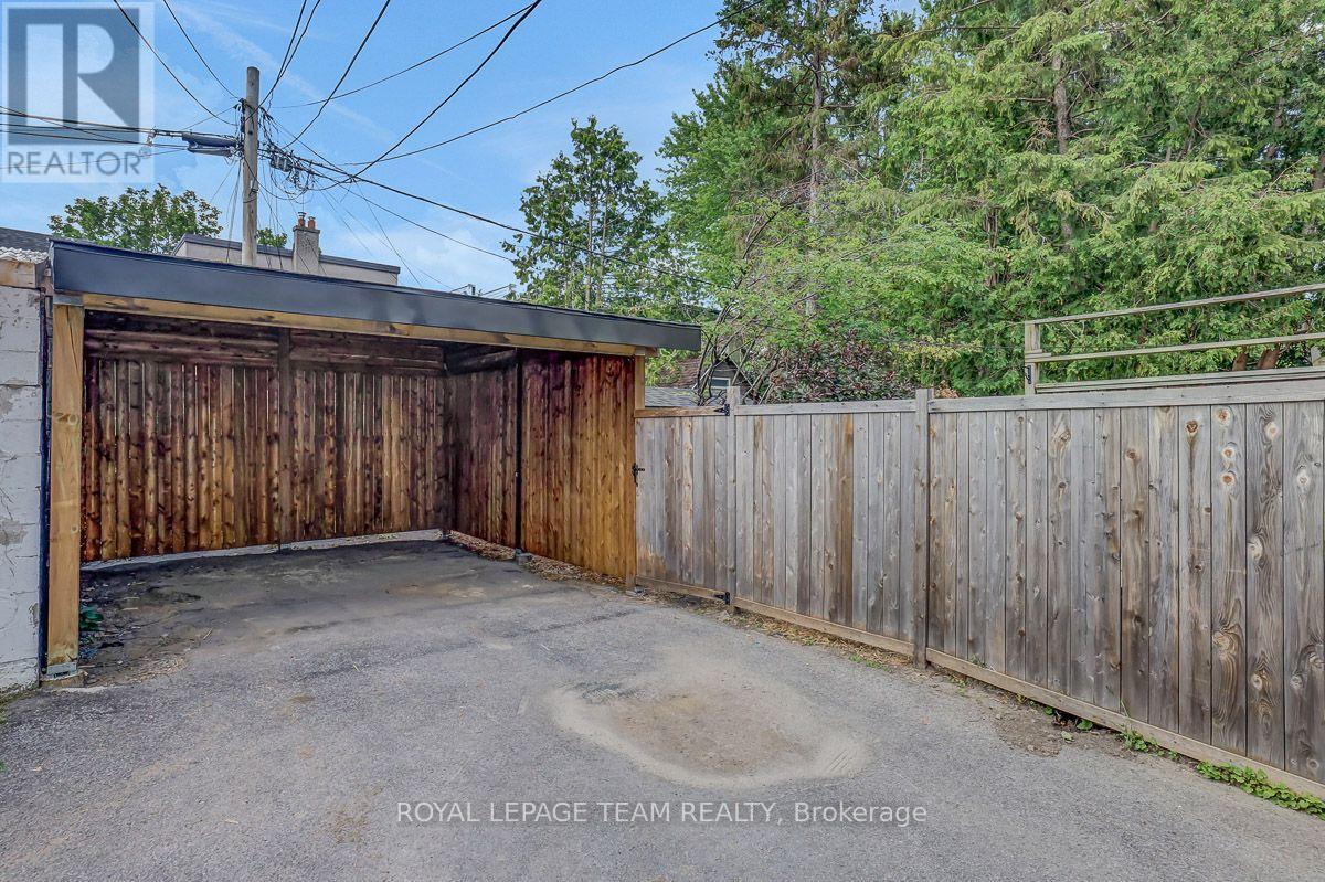 New carport (2026).  Asphalt inside will be redone