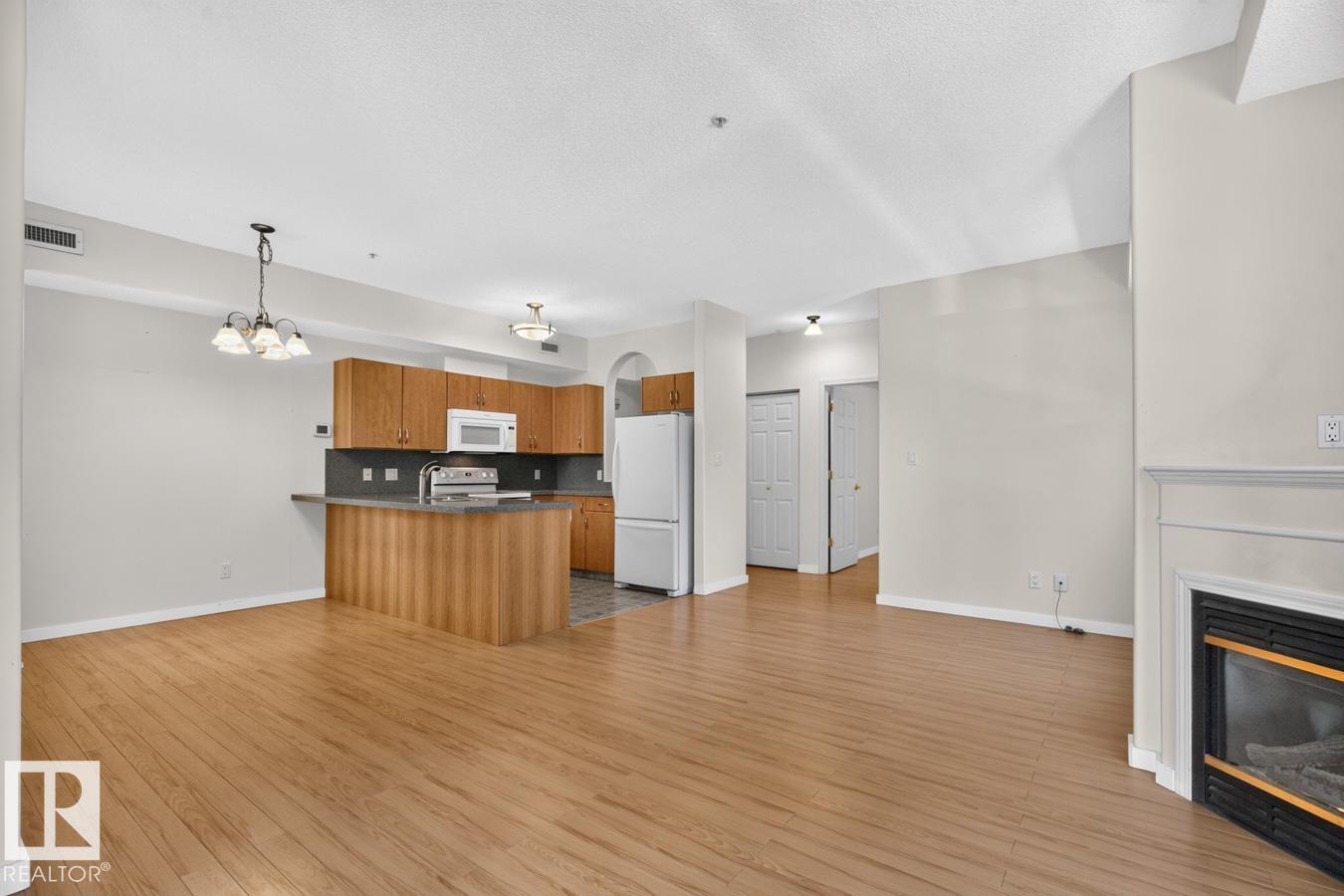 #203 8488 111 ST NW - 10