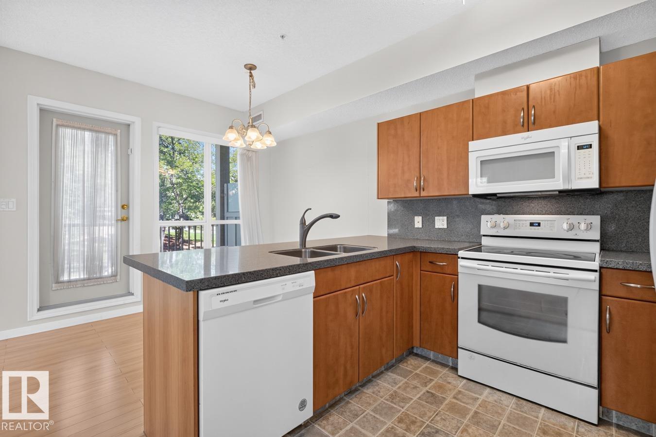 #203 8488 111 ST NW - 14