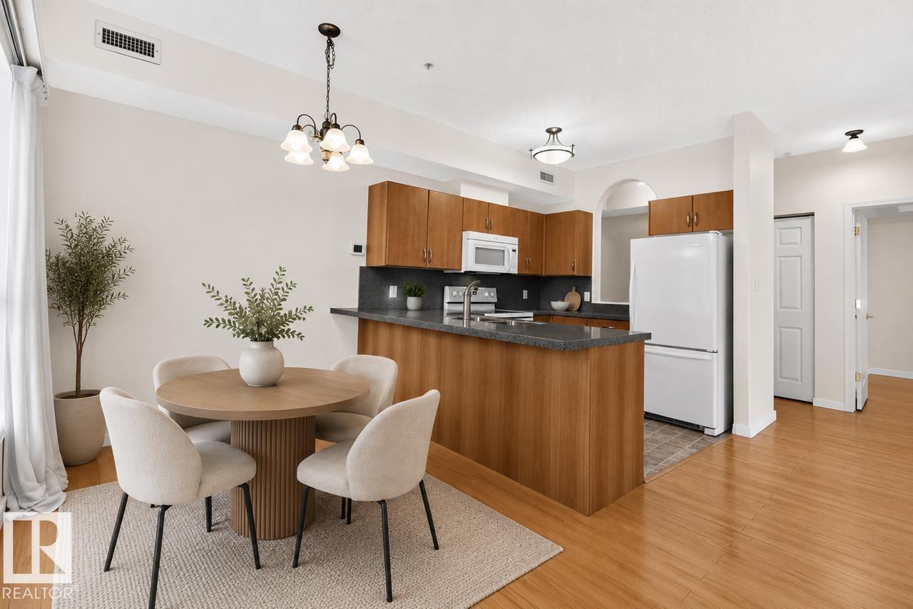 #203 8488 111 ST NW - 16