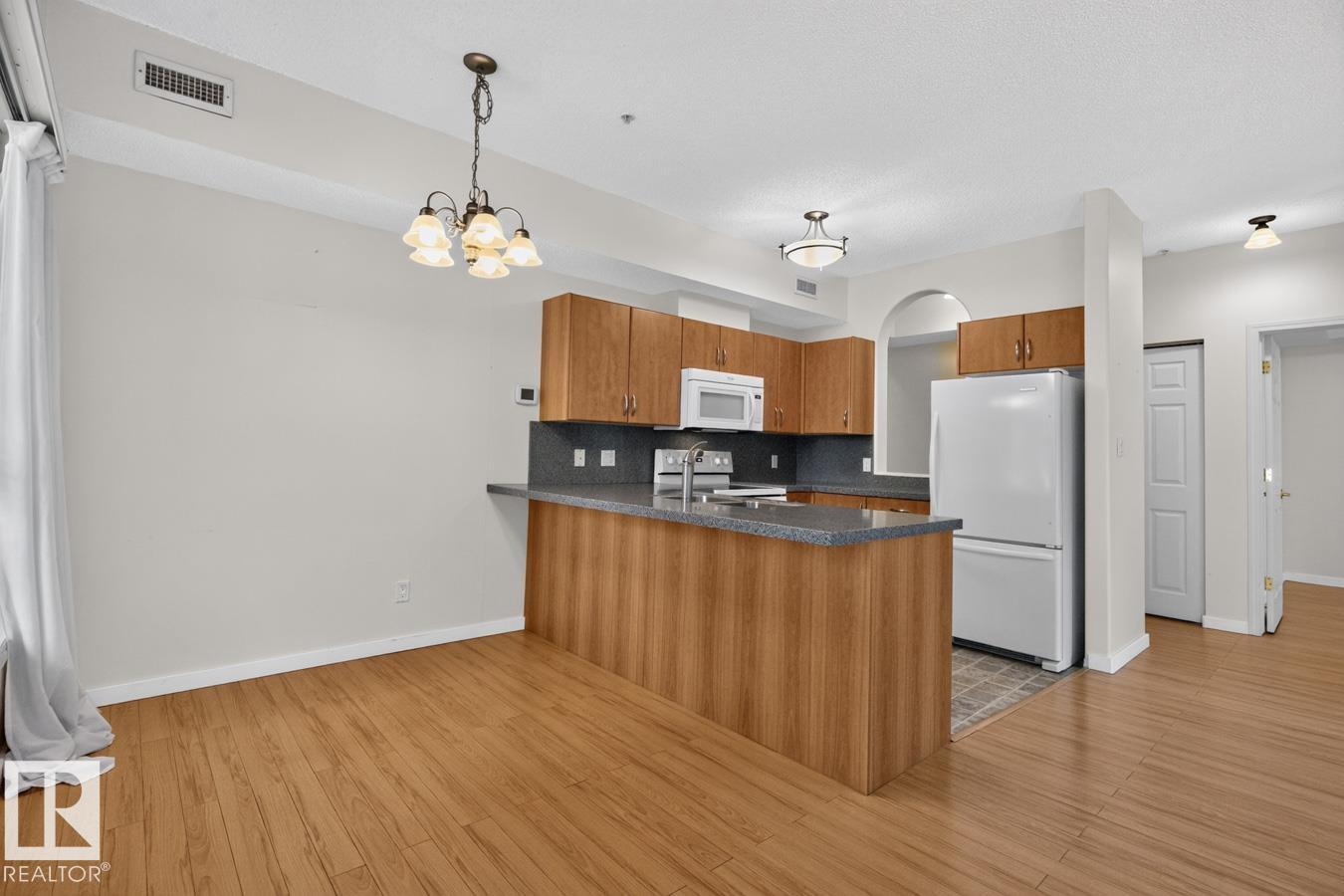 #203 8488 111 ST NW - 17