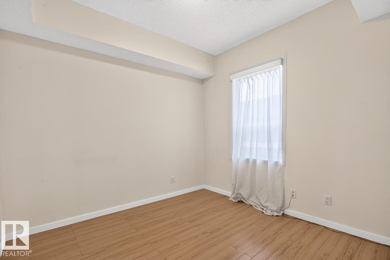 #203 8488 111 ST NW - 24