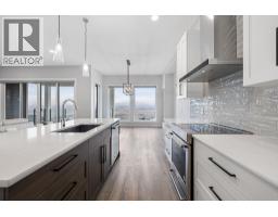 Kitchen - 1940 Foxtail Terrace, Kelowna, BC V1P1T9 Photo 12