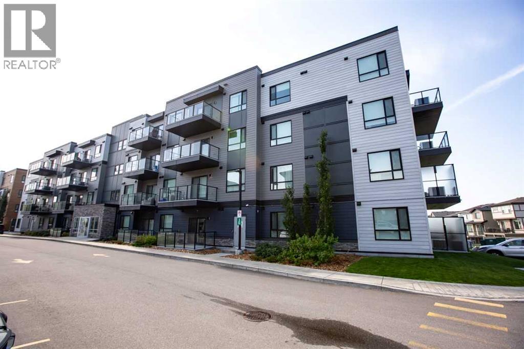 #1403 42 Cranbrook Gardens SE - 1
