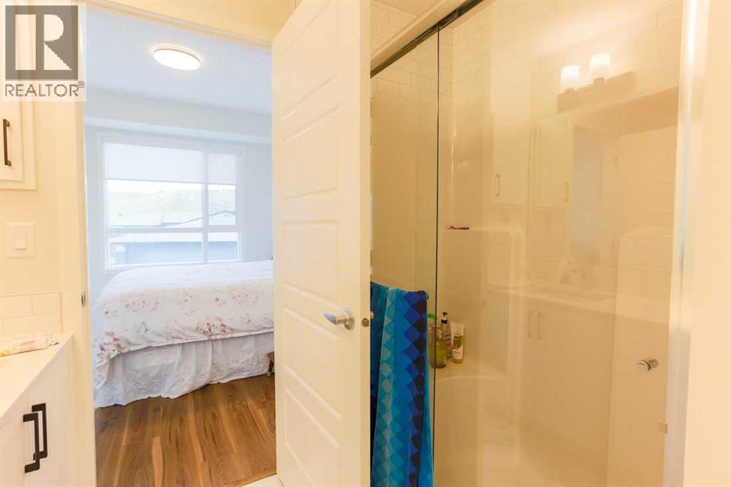 #1403 42 Cranbrook Gardens SE - 14