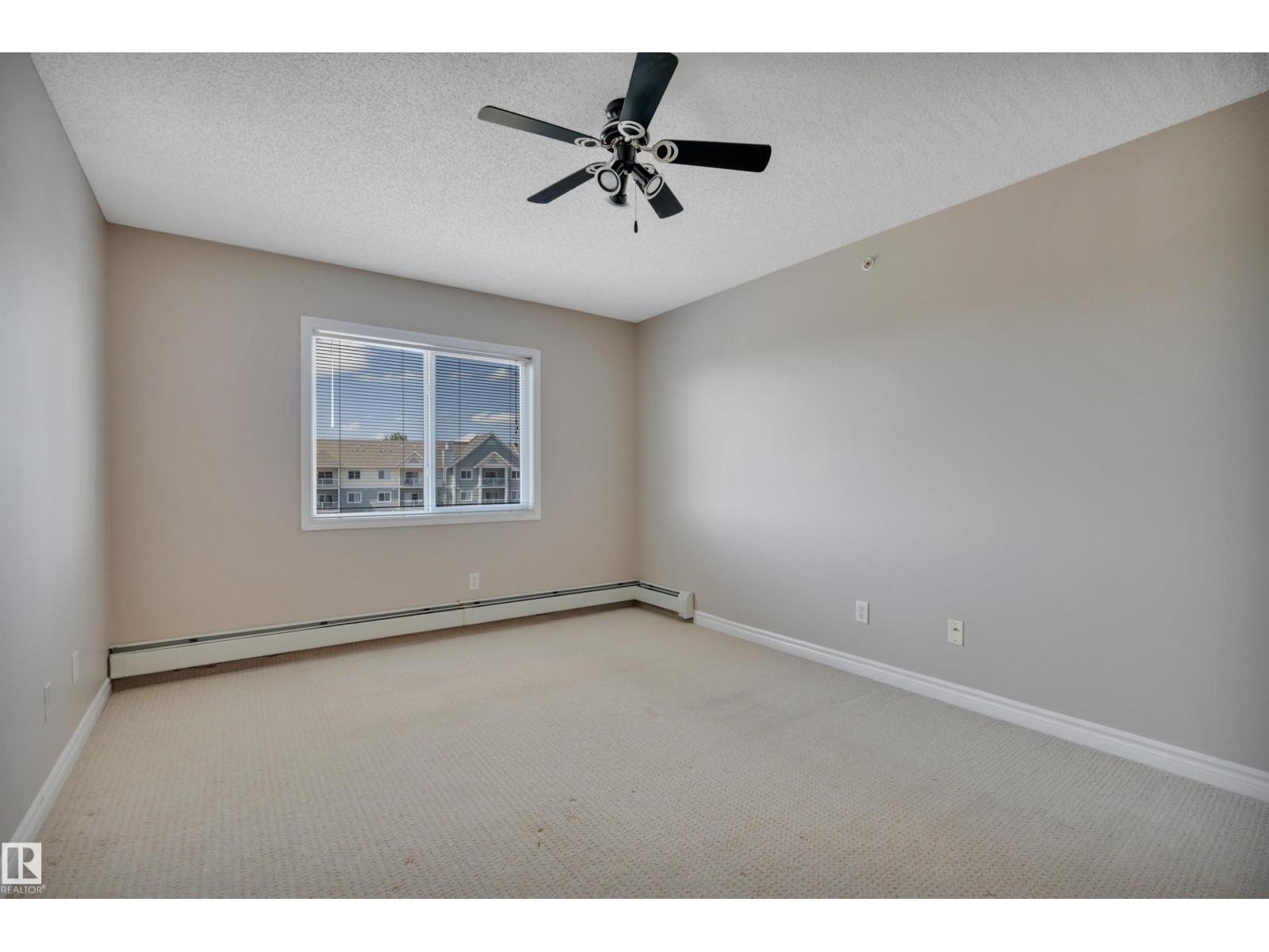 #412 70 WOODSMERE CL - 23