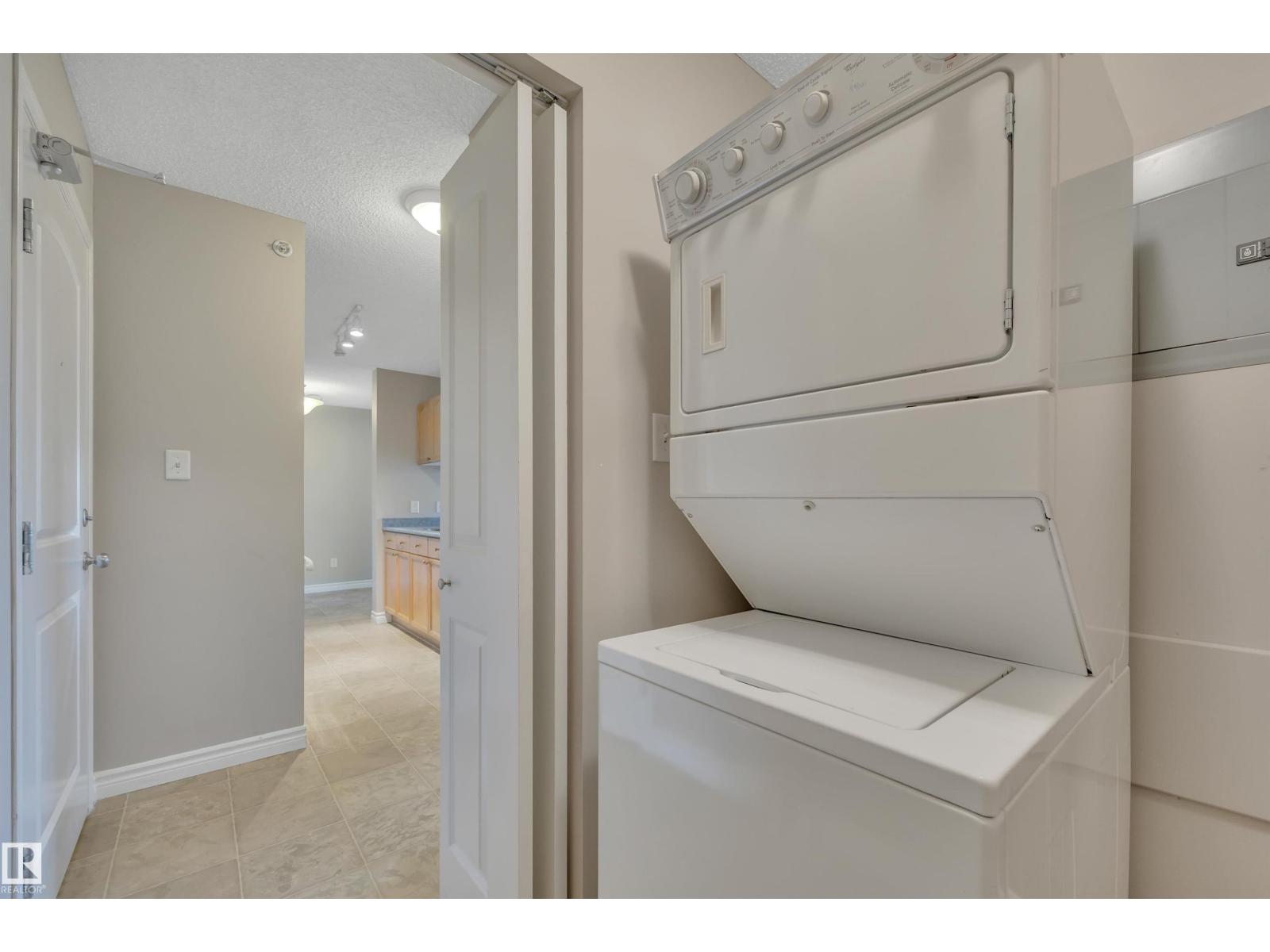 #412 70 WOODSMERE CL - 31