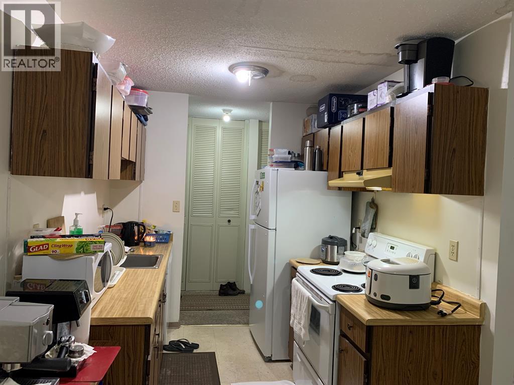 #211 5317 5 Avenue - 4