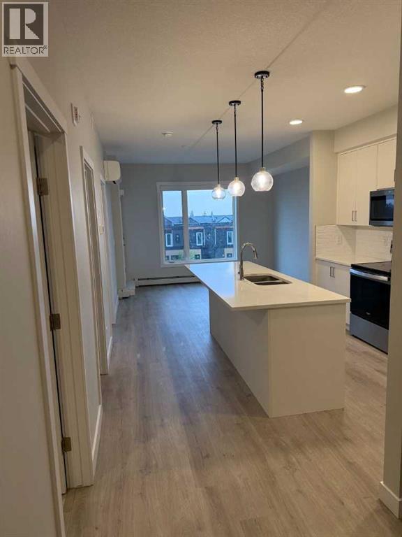 #308 660 Shawnee Square SW - 1