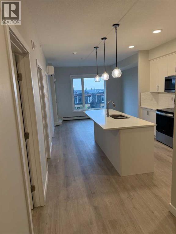 #308 660 Shawnee Square SW - 2