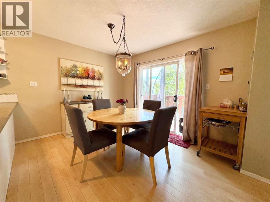 Dining area with doors to deck