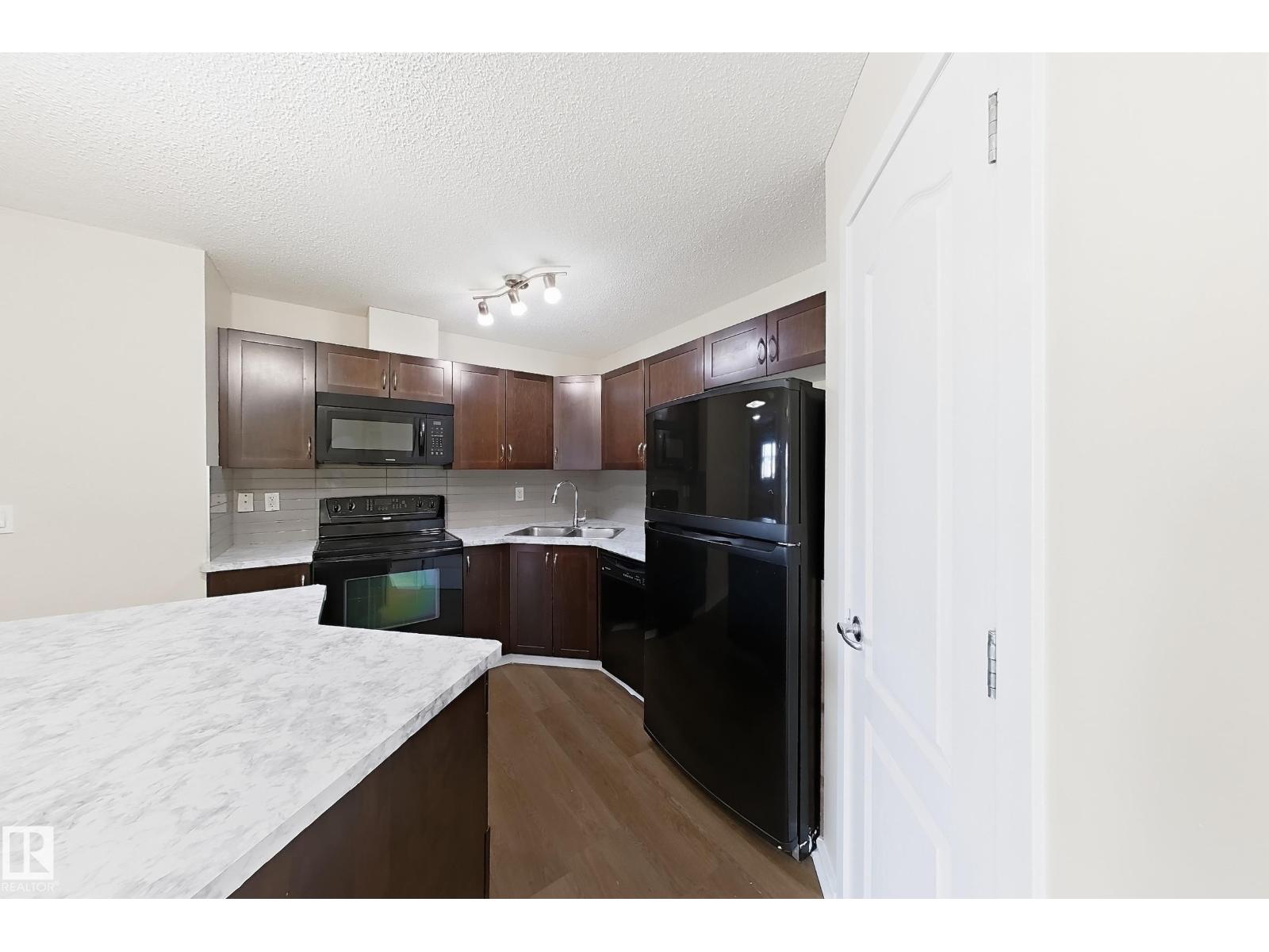 #320 392 SILVER BERRY RD NW - 10