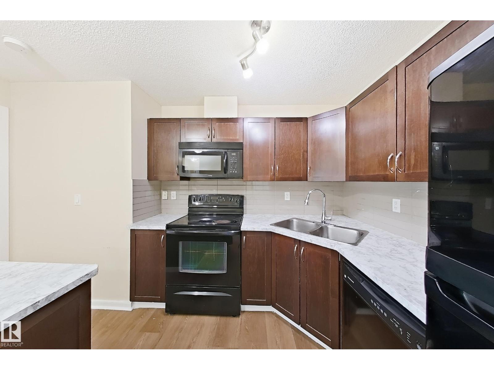#320 392 SILVER BERRY RD NW - 11