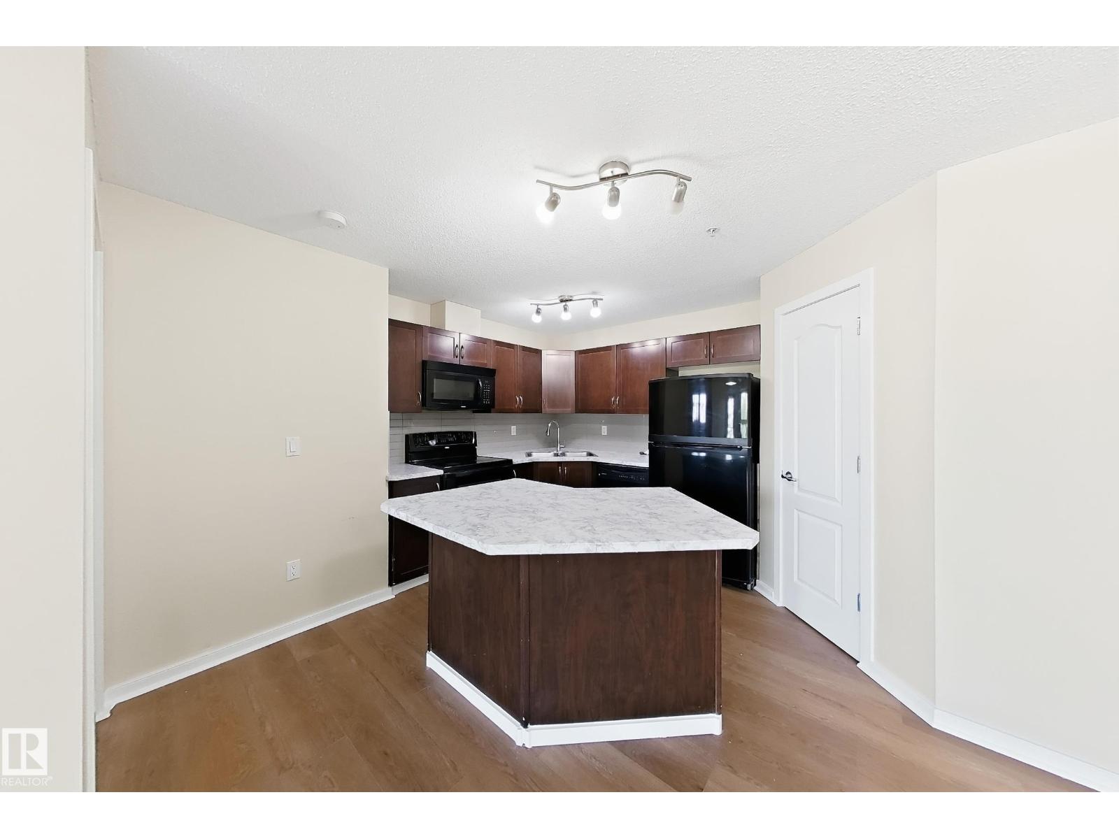 #320 392 SILVER BERRY RD NW - 12