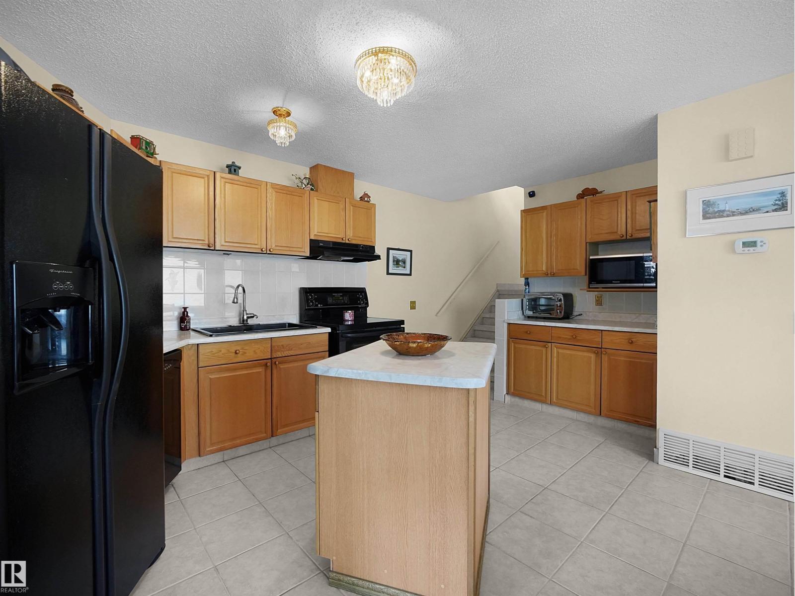 10711 24 AV NW - 11