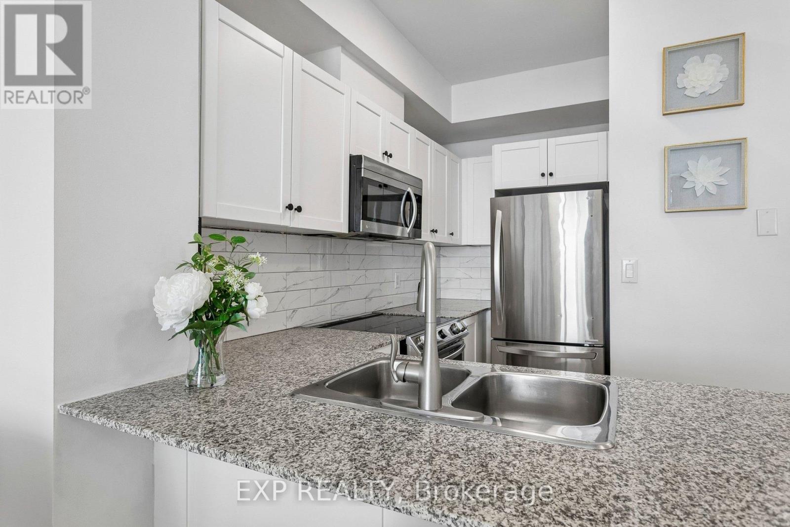 #1406 1359 RATHBURN ROAD E - 7