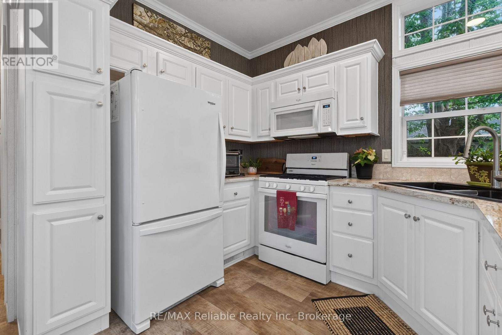 50 PORTSIDE DRIVE - 77719 BLUEWATER HIGHWAY - 11