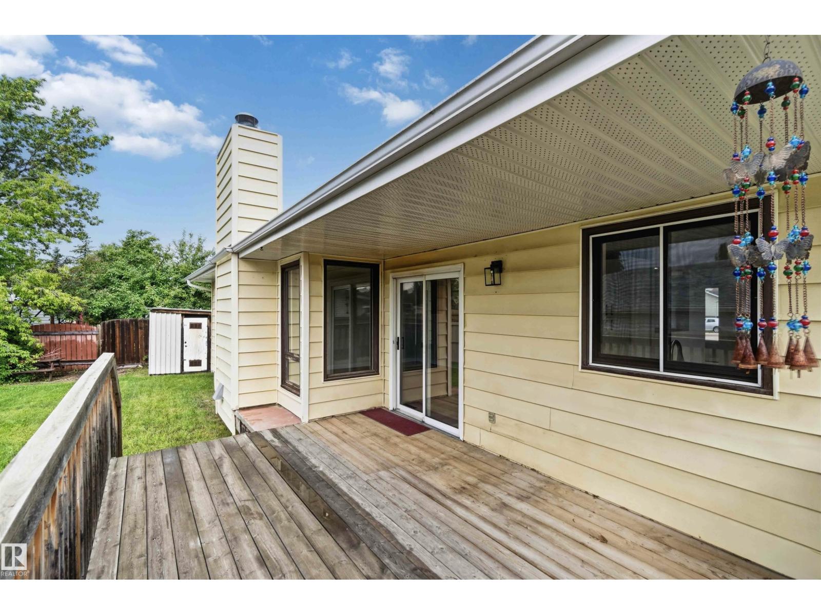 7715 15 AV NW - 69