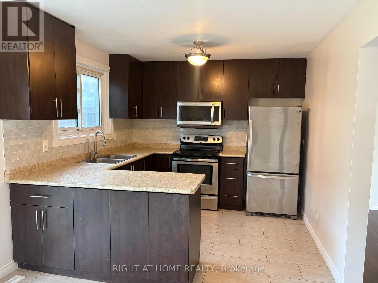Loads of Cabinetry and Kitchen Work Space